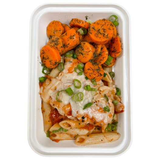 A prepared meal of chicken parmesan featuring chicken breast, pasta with tomato sauce, and dill carrots.