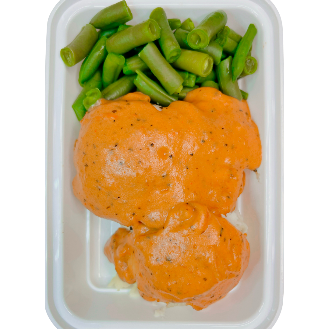 Baked Chicken breast smothered in a creamy sun-dried tomato parmesan cheese sauce. Served with buttery mashed potatoes and green beans.