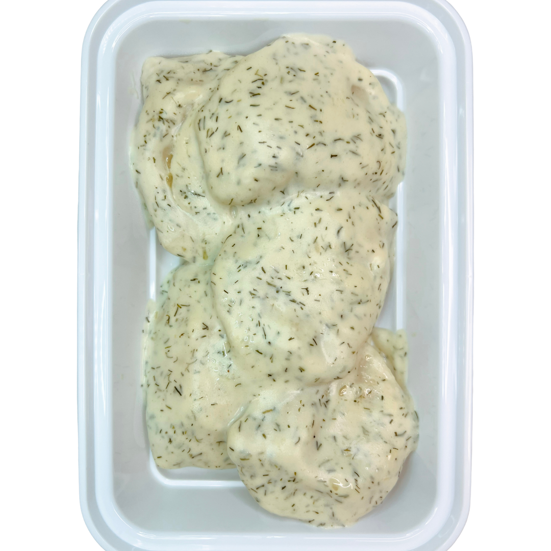 Potato & Cheddar perogies tossed in a rich creamy dill sauce with buttery sautéed onions.